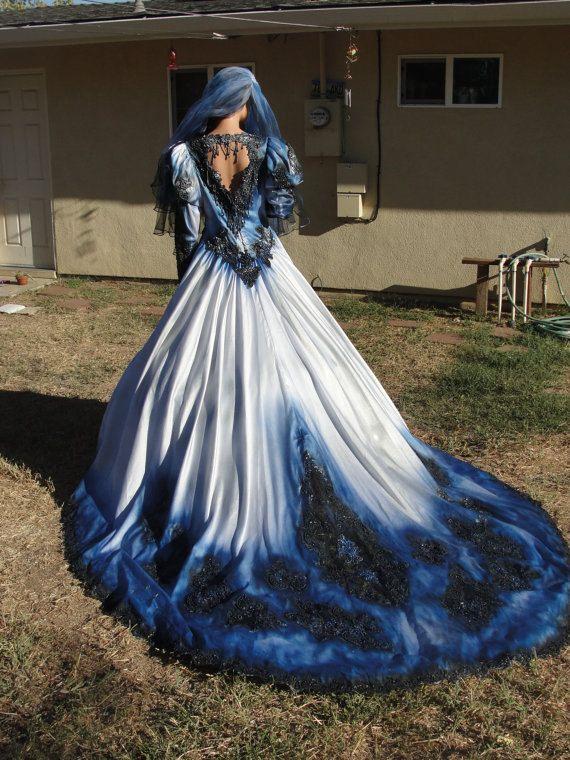 زفاف - Blue And Black Metalic Wedding Gown With Matching Veil. Features Shimmering Metalic Fading Colors And Open Back Detail. Hanging Beads In Bac