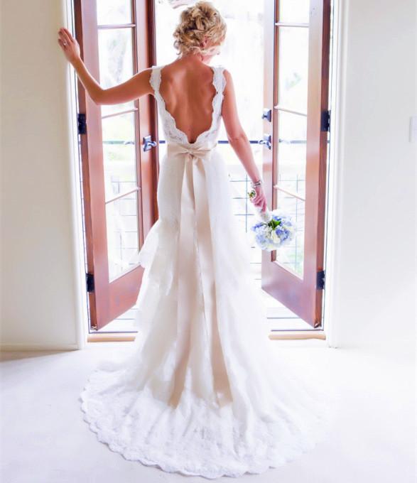 Hochzeit - Sexy V-neck Court Train 3 Tiers Smooth Soft Lace Backless Boho Wedding Dresses with Ribbon Sash Bohemian Bridal Gowns Online with $146.6/Piece on Gama's Store 