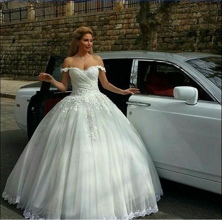 Свадьба - Exquisite Lace Winter Fall Wedding Dresses Off Shoulder Arbic Chapel Train 2015 A Line Tulle Appliqued Dubai Bridal Ball Gown Custom Online with $129.06/Piece on Hjklp88's Store 