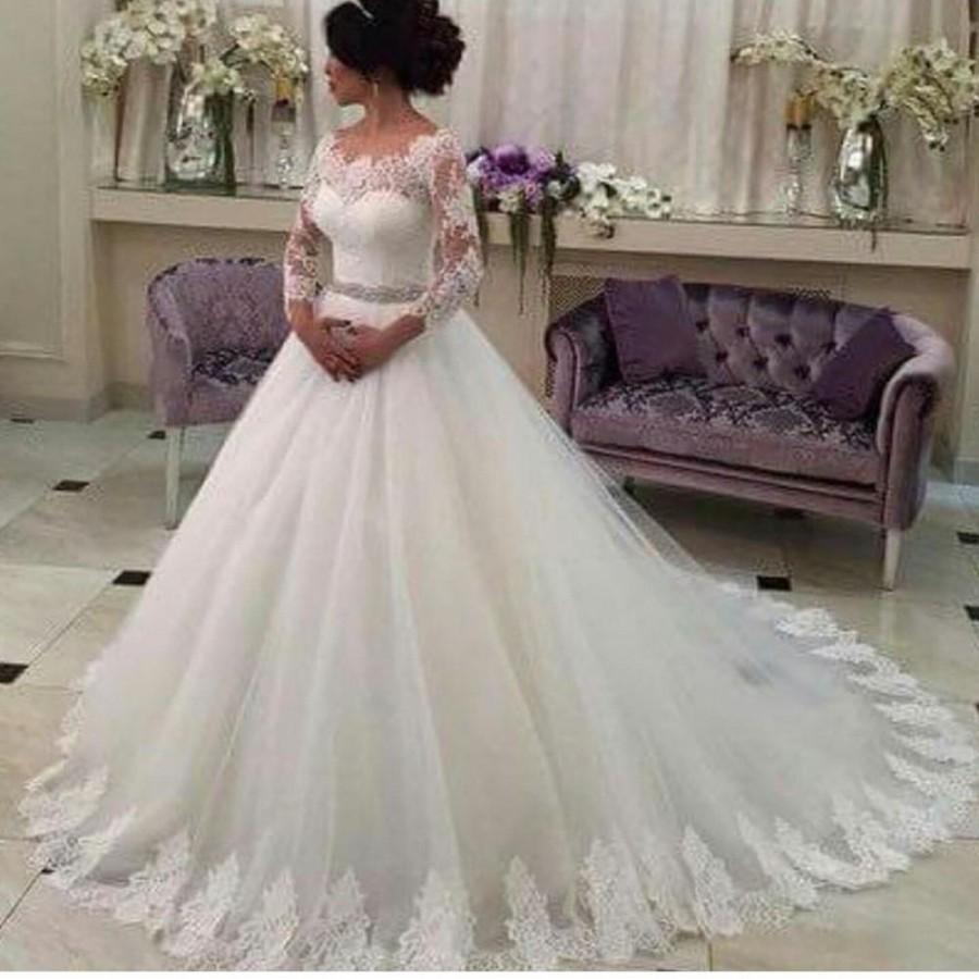 Mariage - Real Picture 3/4 Long Sleeves Wedding Dresses Sheer Illusion Winter Scoop Neckline Beaded Belt Lace Tulle Chapel Train Bridal Gowns A-Line Online with $121.94/Piece on Hjklp88's Store 