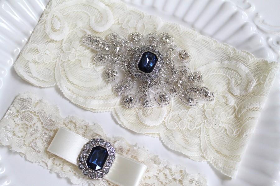 Hochzeit - Bridal rhinestone applique heirloom garter set. Cream/ Ivory stretch lace Something Blue Sapphire Gem wedding garter. BLUE SAPPHIRE