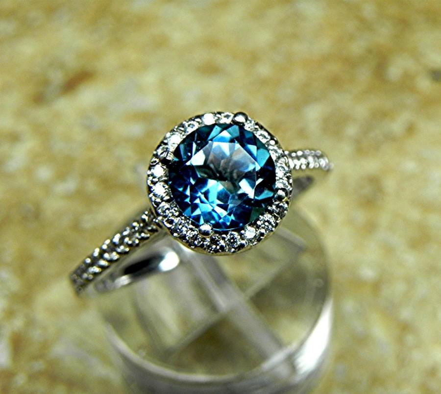 Mariage - AAAA London Blue Topaz 7.00 mm Round Natural (1.50ct) 14K white gold Halo ring with .30 carats of diamonds
