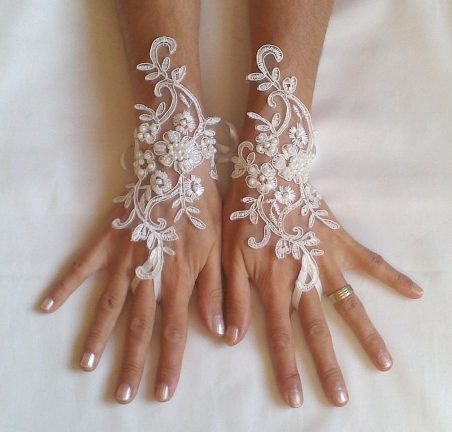 Hochzeit - Free ship Wedding gloves beaded pearls Ivory  bridal gloves lace gloves fingerless gloves french lace gloves free ship