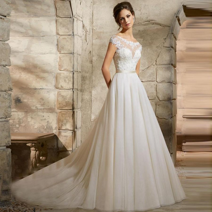 Mariage - 2016 Good Quality Appliqued Sexy Ivory Tulle Girl Princess Lace Wedding Dresses Vestidos De Novia Big Gown White Dresses Online with $102.1/Piece on Hjklp88's Store 