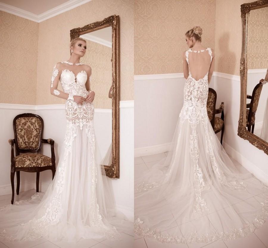 Mariage - 2016 New Alluring Wedding Dresses Sheer Neck Lace Applique Long Sleeves Bridal Gowns Wedding Gowns With Long Train Court Train Custom Made Online with $196.34/Piece on Hjklp88's Store 