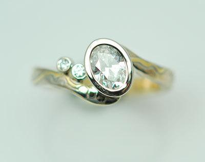 زفاف - Custom Handcrafted Mokume Gane Engagement Ring with Oval Setting and Diamond Accents