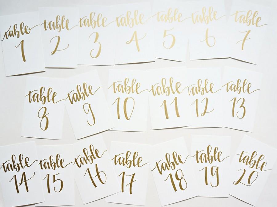زفاف - gold calligraphy wedding table numbers // handwriting in calligraphy font for wedding decor // table signs for wedding guest tables