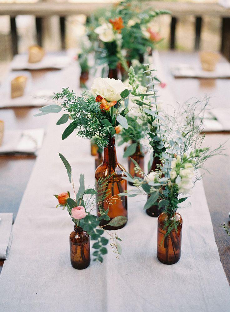 Свадьба - Empty Glass Bottles Fill In As Gorgeous Wedding Centerpieces