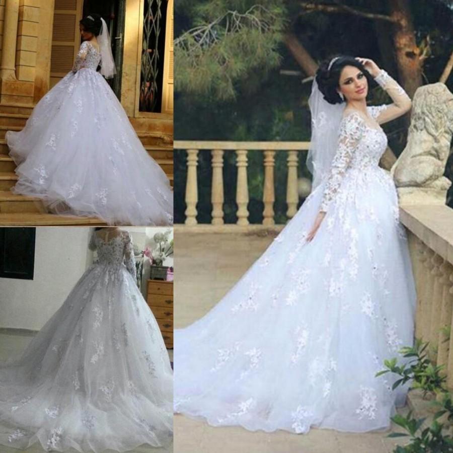 Mariage - Vintage Beaded Appliques Long Sleeves A-line Wedding Dresses 2016 Sheer Jewel Neck Bodice Zipper Back Wedding Bridal Gowns Chapel Train Online with $130.57/Piece on Hjklp88's Store 