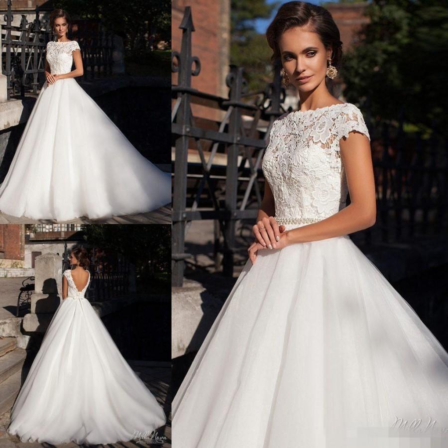 Mariage - New Arrival 2016 Lace Bateau Wedding Dresses Capped Beads Tulle Sheer Crystal Ribbon Sash Backless Milla Nova Bridal Ball Gowns Cheap Online with $108.25/Piece on Hjklp88's Store 