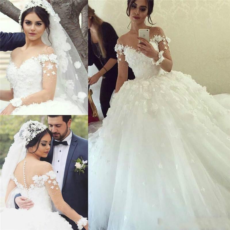 Mariage - Amazing 2016 Long Sleeves Illusion Wedding Dresses Lace Appliqued Flowers Sheer Sweetheart Tulle Bridal Ball Gowns Covered Button Online with $113.66/Piece on Hjklp88's Store 