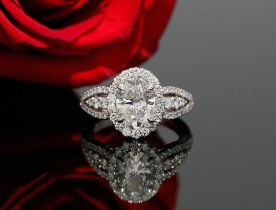 زفاف - 9x7mm Oval Forever One Moissanite and Diamond Halo Engagement Ring in 14k White Gold (avail. in rose, white, yellow gold and platinum)