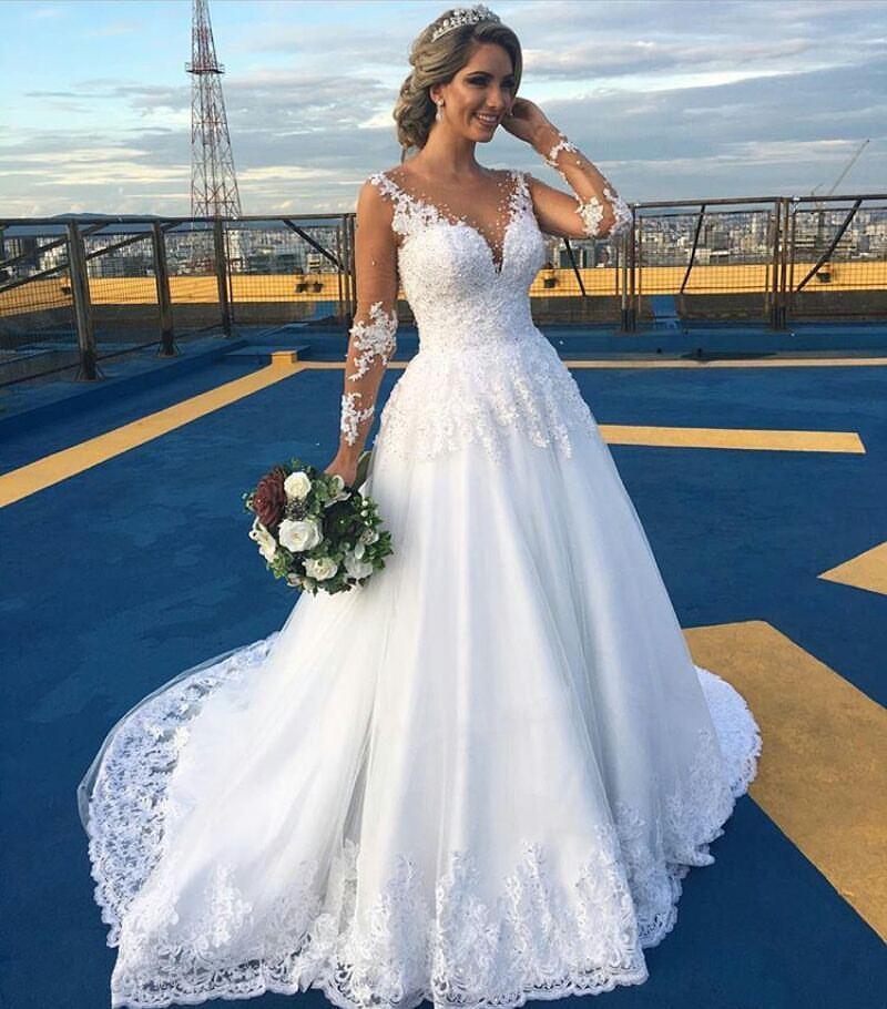 زفاف - 2016 New Arabic Wedding Dresses Illusion Neck Appliques Cheap Lace Pearls A Line Long Sleeves Sheer Back Plus Size Bridal Ball Gowns Online with $110.81/Piece on Hjklp88's Store 