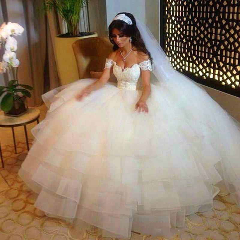 Mariage - Plus Size 2016 Wedding Dresses A-Line Off Shoulder Lace Applique Train Cheap Bridal Ball Gowns Chapel Train Tulle Arabic Vestido De Novia Online with $107.79/Piece on Hjklp88's Store 