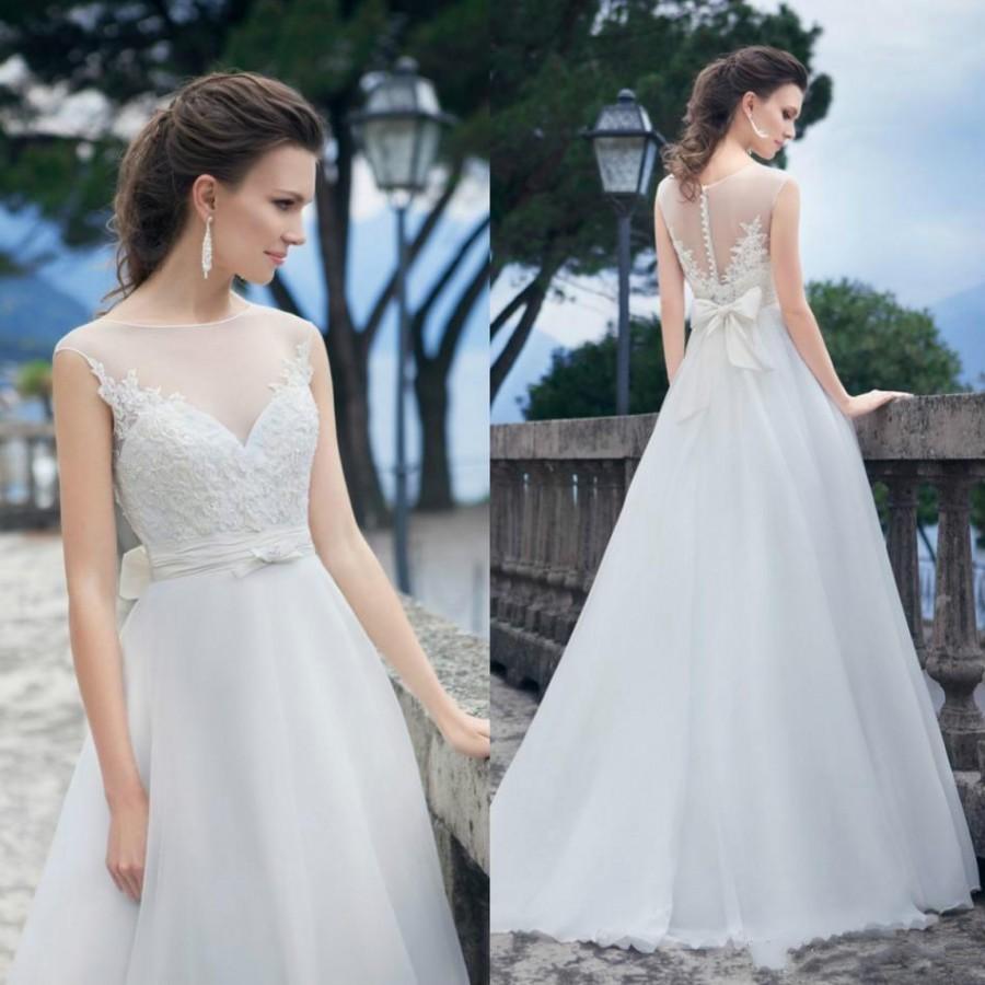 Mariage - Stunning Illusion Spring 2016 Wedding Dresses Sheer Tulle Garden Jewel Neck Sash Bow Applique Tulle Bridal Ball Gowns Vestido De Novia Online with $96.49/Piece on Hjklp88's Store 
