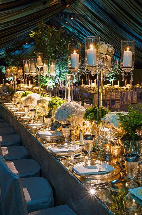 Свадьба - Gorgeous Crystal Candelabras Holding Pillar Candles Compliment The Textured Gold Votives That Surround Below.