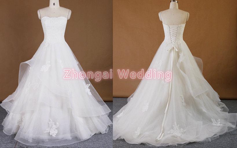 Hochzeit - Lace wedding dress, flounces bridal gown, ruffles bridal dress, sleeveless bridal gown, elegant wedding dress, lace back up, A-line skirt