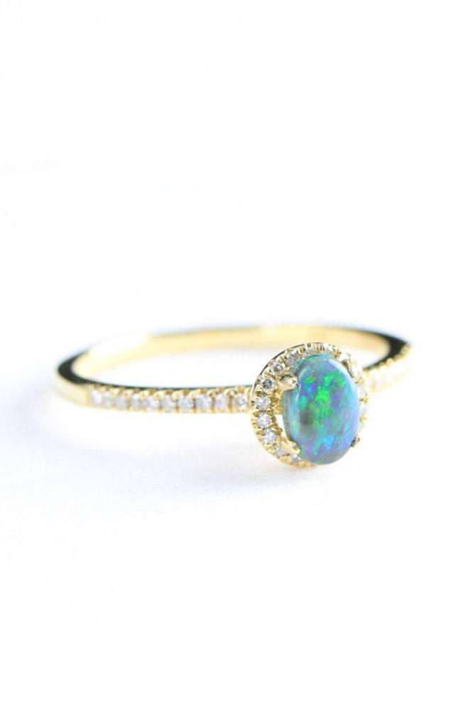Hochzeit - Engagement ring Black opal and diamond halo in 10 carat yellow gold for her