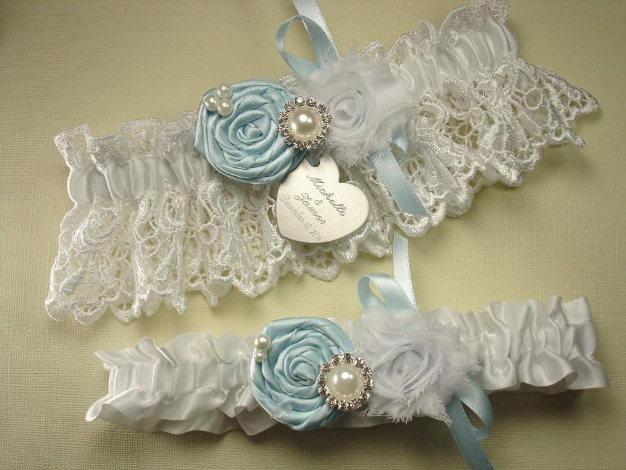 Свадьба - Blue Wedding Garter Set, Personalized Garters in White or Ivory Venise Lace, with Handmade Roses, Pearls, Rhinestones, and Engraving