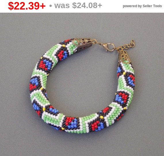 Mariage - SALE Eclectic multi colored bow bracelet modern style  Hand bead crochet Jewelry rope geometric print boho hippie festival rustic beaded ...