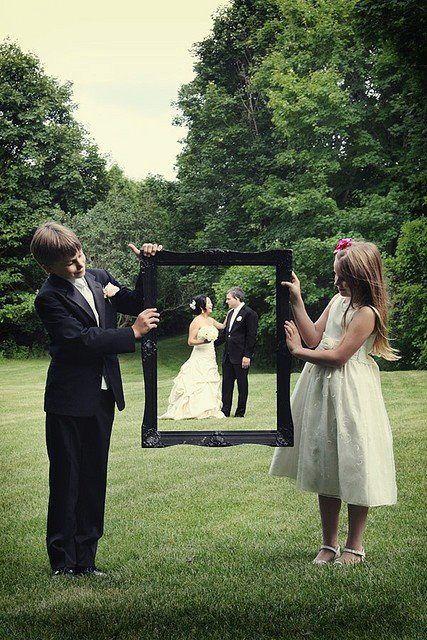 Wedding - Gallery: Flower Girl And Ring Bearer Capture The Bride & Groom