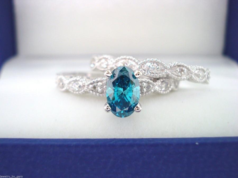 Oval Blue Diamond Engagement Ring 