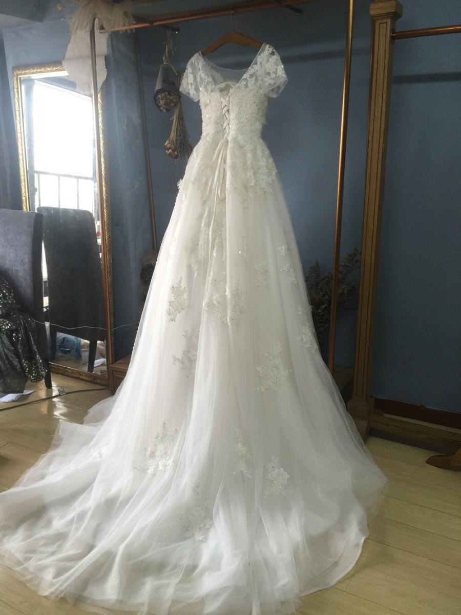Wedding - Aliexpress.com : Buy Boat Neck A line/Princess Ivory Tulle Wedding Dress with Short Sleeves from Reliable wedding dress with swarovski crystals suppliers on Gama Wedding Dress