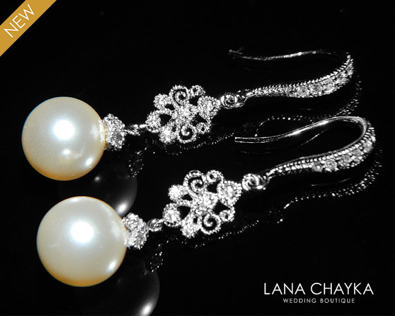 Hochzeit - Bridal Pearl Chandelier Earrings Swarovski 10mm Ivory Pearl Silver Dangle Earrings Ivory Pearl Wedding Jewelry Bridal Pearl Drop Earrings