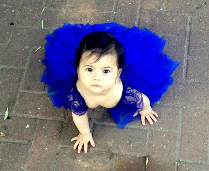baby girl in blue dress