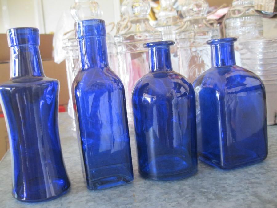 Mariage - 4-COBALT/ blue Decorative Colored glass bottles, floral Bud vase, vintage inspired, Home Decor, Wedding