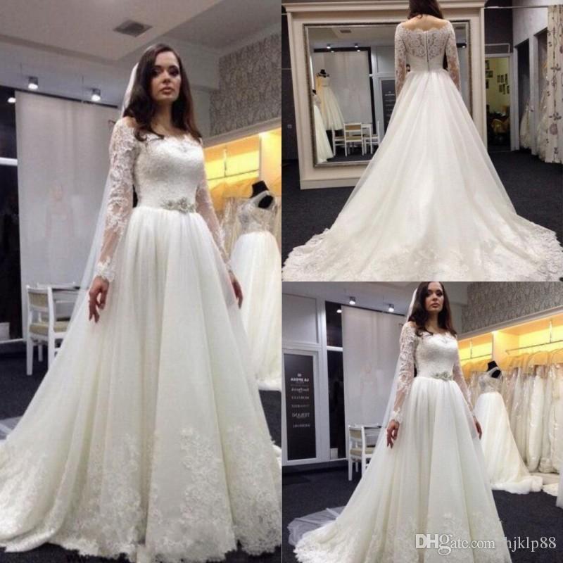 Mariage - 2017 New Vestios De Novia A-line Wedding Dresses Illusion Long Sleeves Lace Applique Bridal Gowns Beaded Sash Buttons Backless Wedding Dress Lace Luxury Illusion Online with 165.72/Piece on Hjklp88's Store 