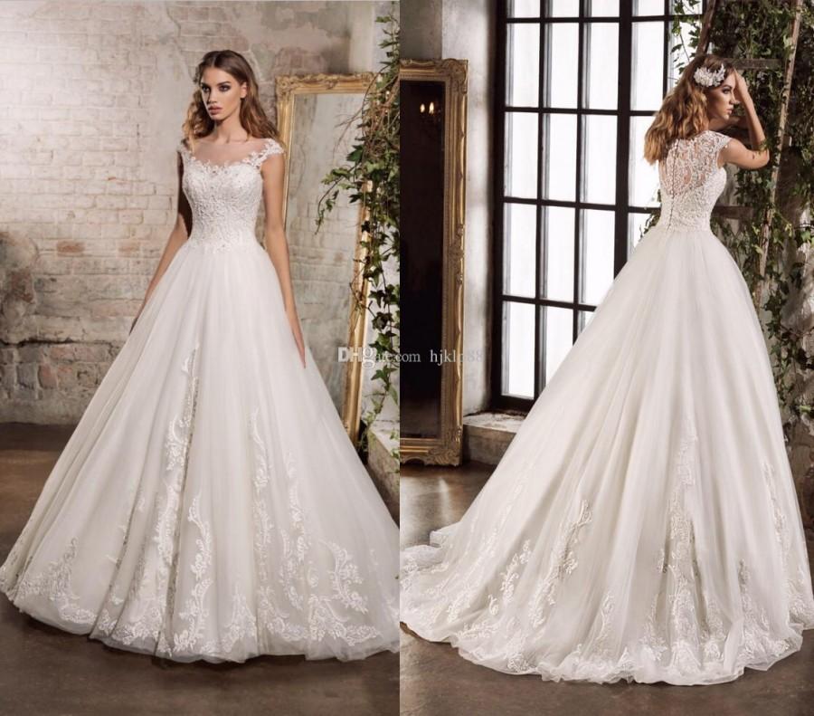 Hochzeit - 2017 New Bateau Sheer Neck Lace Wedding Dresses Applique Beads Tulle Bridal Gowns A-Line Garden Wedding Dress Zipper Lace Luxury Illusion Online with $165.72/Piece on Hjklp88's Store 