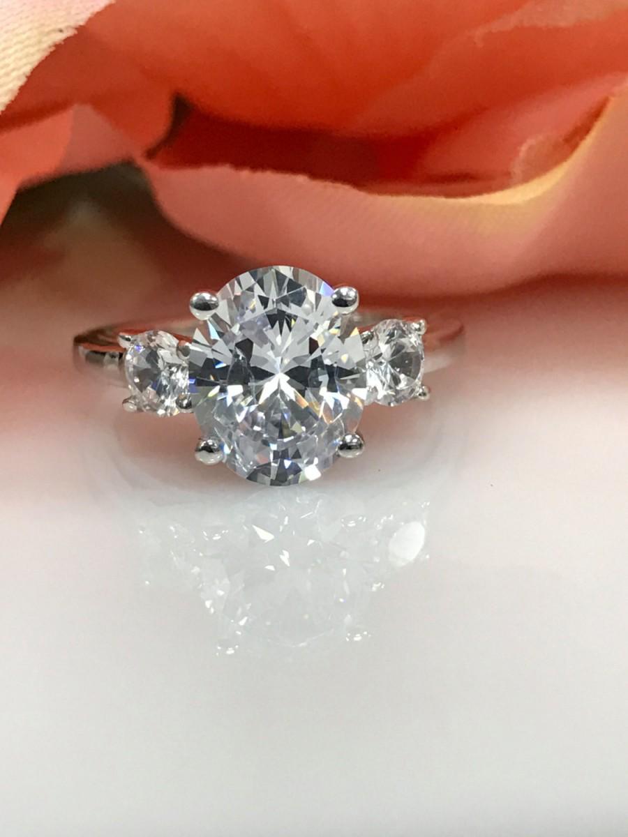 زفاف - 3.50 CTW Oval Engagement/Wedding/Promise Ring with 2 Side Stones Set in a Solid 14k White Gold Cris Cross Mounting Item #4617