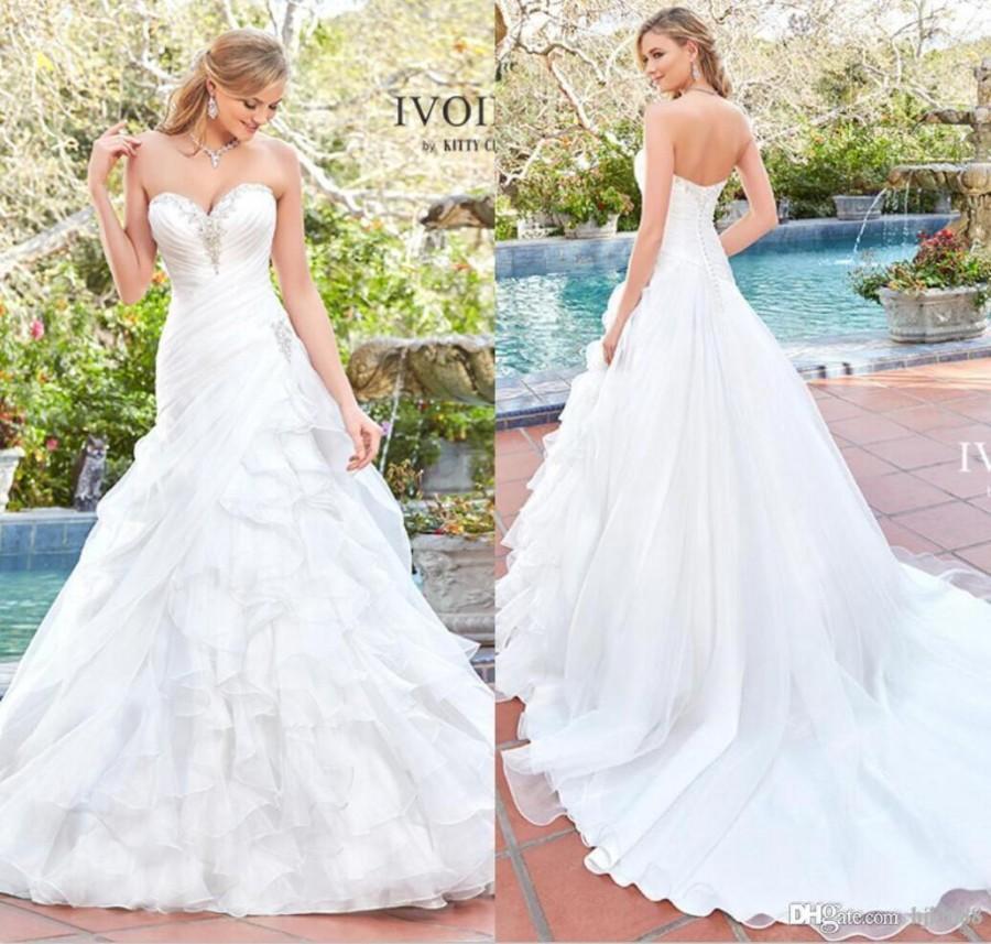 Mariage - Kitty Chen 2017 New Arrival A Line Organza Wedding Dresses Sweetheart Strapless Beaded Ruffles Wedding Dress Bridal Gowns White/Ivory Lace Luxury Illusion Online with $160.0/Piece on Hjklp88's Store 