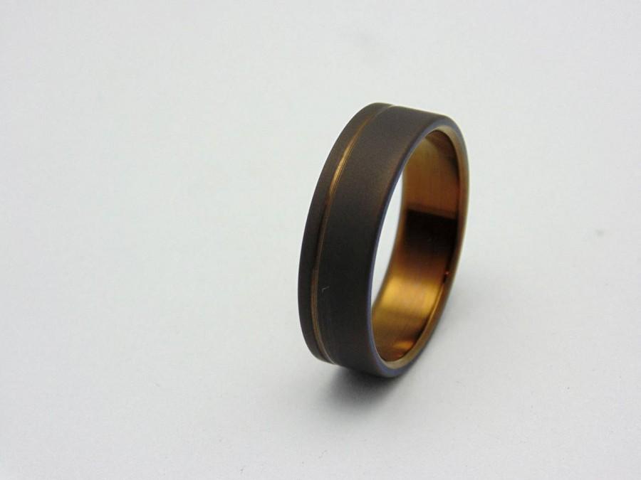 Hochzeit - Titanium ring with Antique Bronze pinstripe and center,  Handmade titanium wedding band