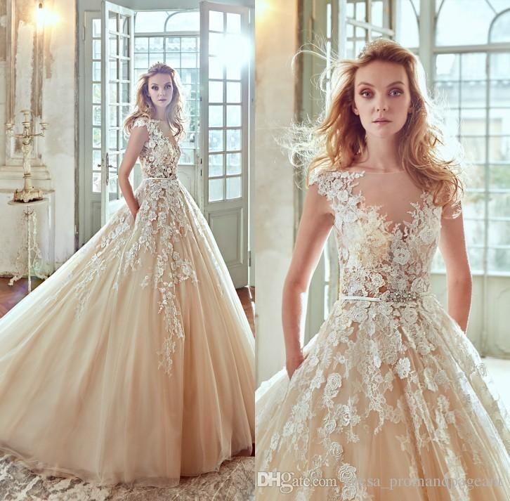 Mariage - Nicole Spose 2017 Champagne 3d Floral Appliques Wedding Dresses A Line Sheer Neck Cap Sleeve Court Train Tulle Bridal Gowns With Pockets Wedding Clothes Wedding Dress Sale From Olesa_promandpageant, $148.35