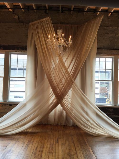 Wedding - These Chandelier-and-Chiffon Wedding Ceremony Backdrops Are Super Trendy