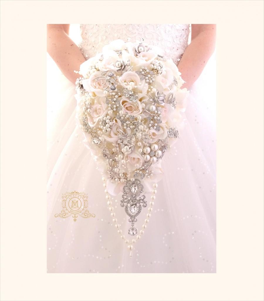 Hochzeit - Off white, ivory, touch of pink BROOCH BOUQUET. Silver jeweled silk roses flowers teardrop cascading broach bouquet. Pearls bling wedding