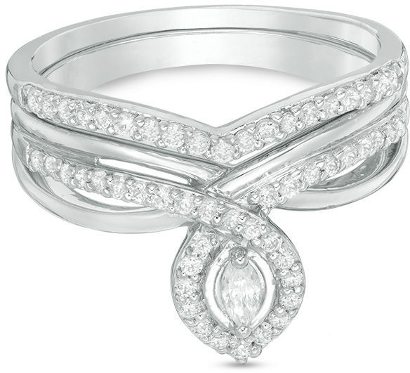 Hochzeit - 1/3 CT. T.W. Marquise Diamond Frame Twist Shank Bridal Set in Sterling Silver