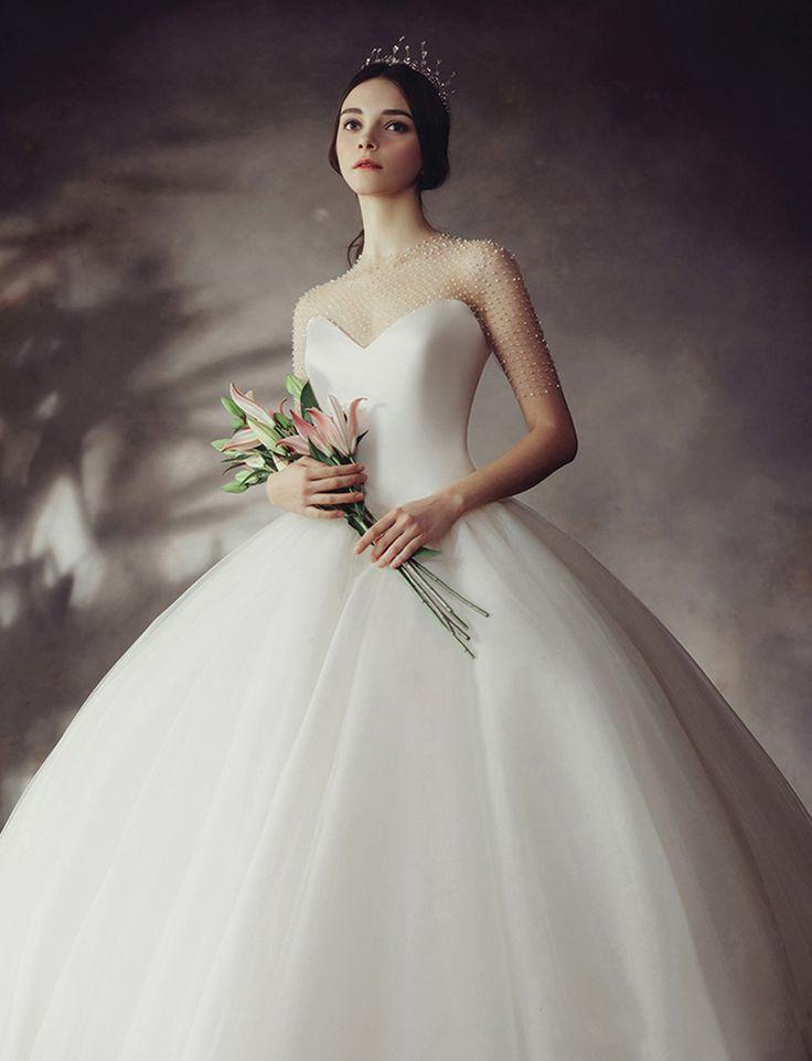 زفاف - 15 Timessly Elegant Wedding Dresses That Will Never Go Out Of Style!