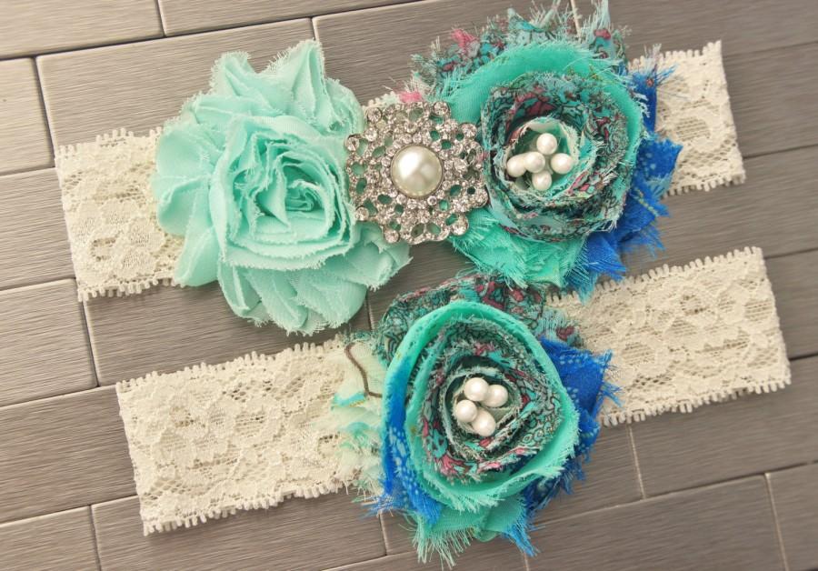 Свадьба - Teal Peacock Wedding garder, Something Blue Garter Set, Lace Garter w/ Flowers, Pearl and Bling Accents, Plus size bridal garters available