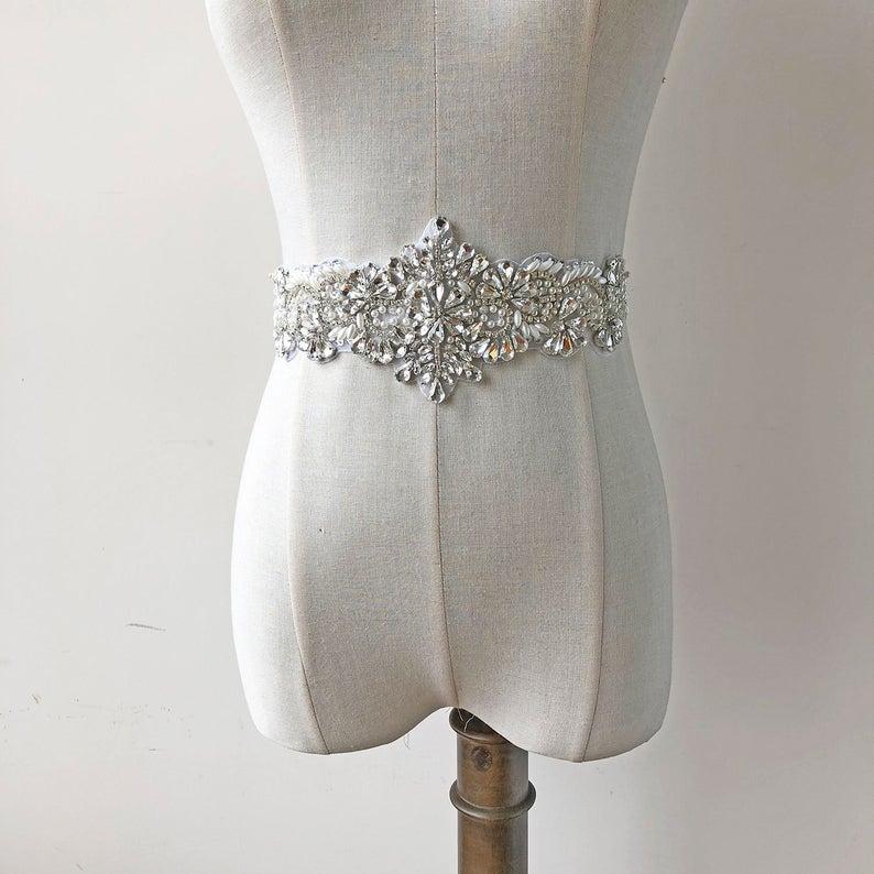 Hochzeit - Shine Crystal sash applique Hot Fixed Rhinestone Appliques with Pearl Details Accents for Wedding Dresses Party Dress Prom Costumes