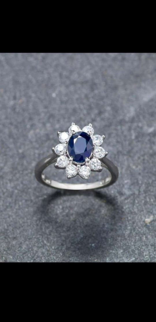 Wedding - Beautiful tanzanite flower design ring with diamonds and 925 sterling silver quality. Wedding/Engagement ring.