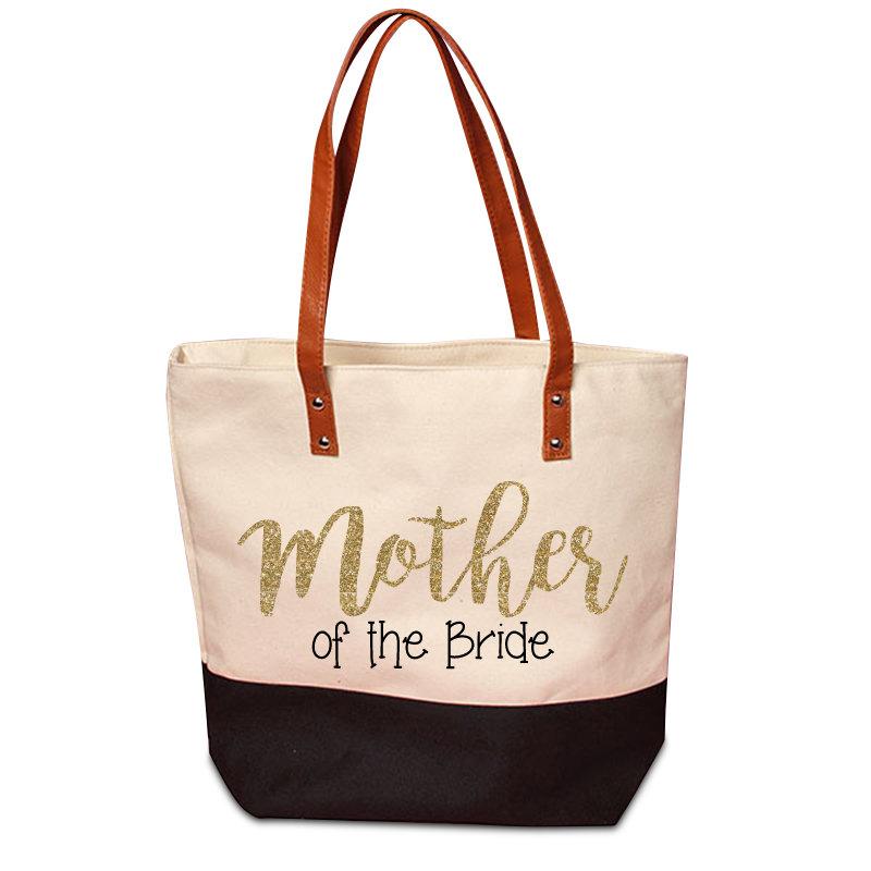 Hochzeit - Cute Mother of the Bride or Groom Black Bottom Canvas Tote with Customized Glitter Design