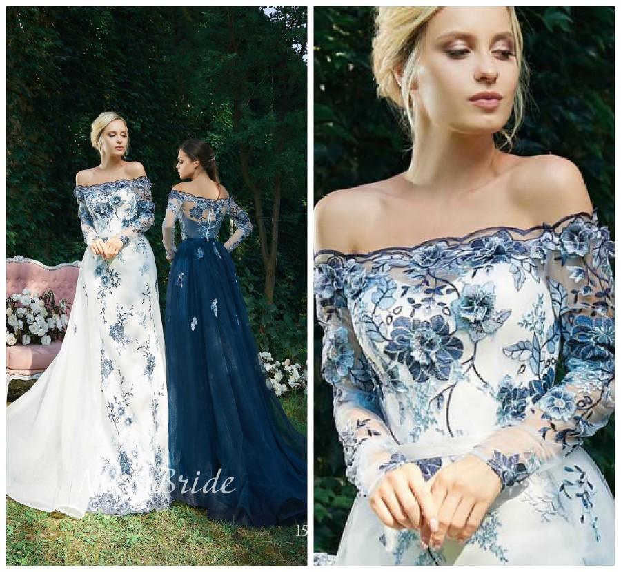 Wedding - Alternative ivory wedding dress with floral 3D guipure. Dress with open shoulders and a long sleeve. Prom blue dress in 3D flowers.