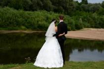 wedding photo - couple by the river