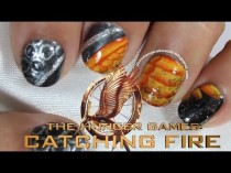 wedding photo - Hunger Games Catching Fire Inspired Nail Art