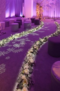 wedding photo - Perimeter Lighting Creates An Icy Glow For This Winter Wedding Venue.