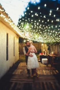 wedding photo - Strung Lights Across Open Sky Area 