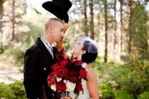 wedding photo - Lacey & David's Mad Hatter garden tea party with an umbrella canopy